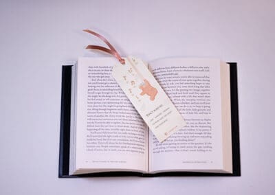 sticky bear bookmarks on book hanging round